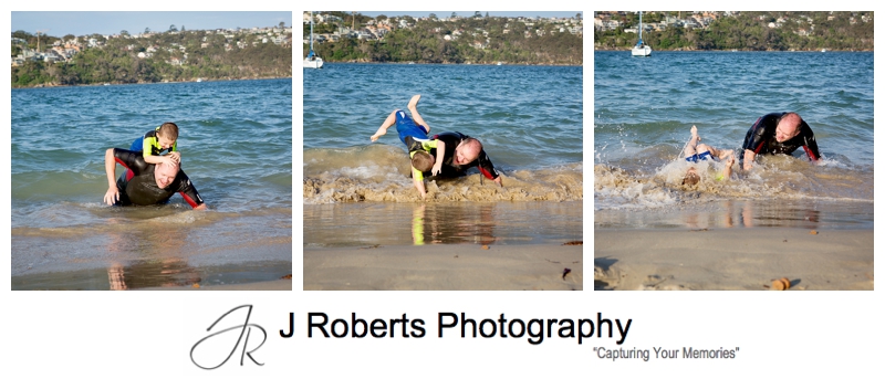 Docu style family portraits with father and son at the beach Chinamans Beach Mosman